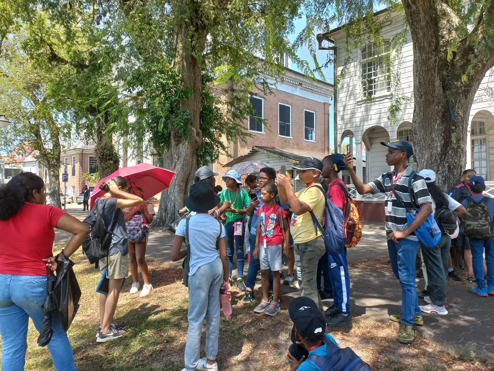 Visitors on a guided walk through the historic inner city of Paramaribo